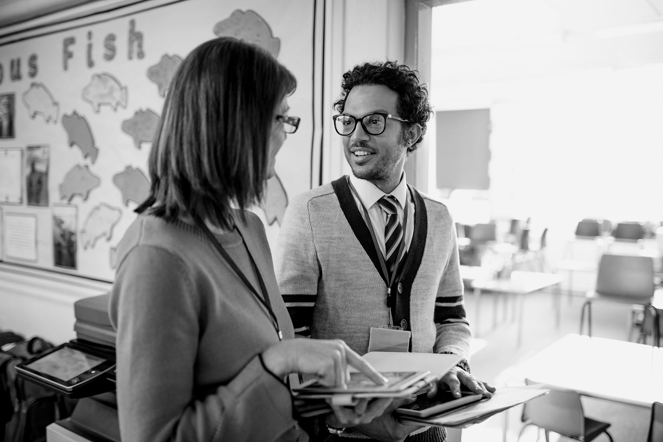 Two teachers having a conversation between classes